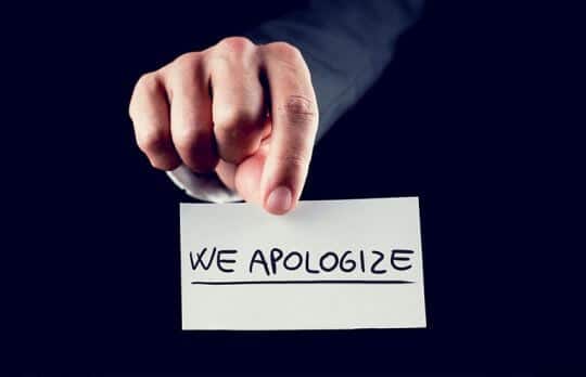 sign that says we apologize admit your mistakes