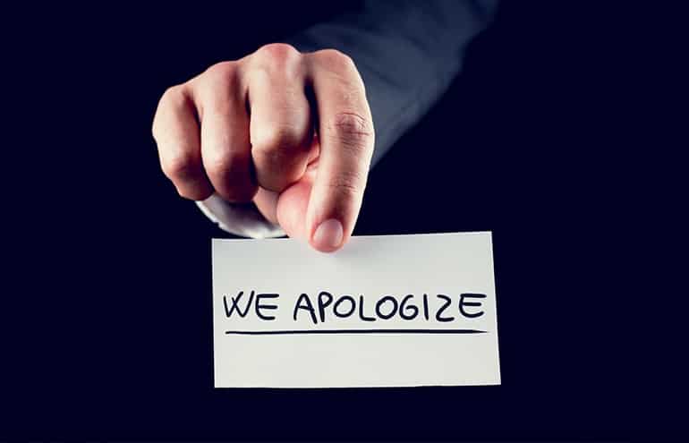 sign that says we apologize admit your mistakes