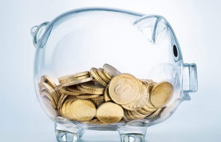 piggy bank with gold coins how much to save for retirement