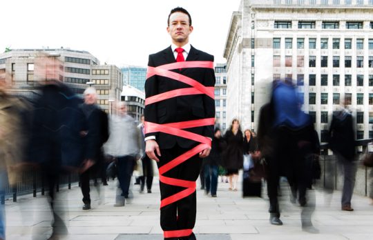 lawyer wrapped up in red tap professional autonomy