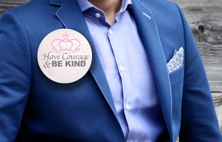 Man with button lapel Need a Motto