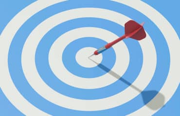 a dartboard with a dart in the middle represents a good legal marketing strategy
