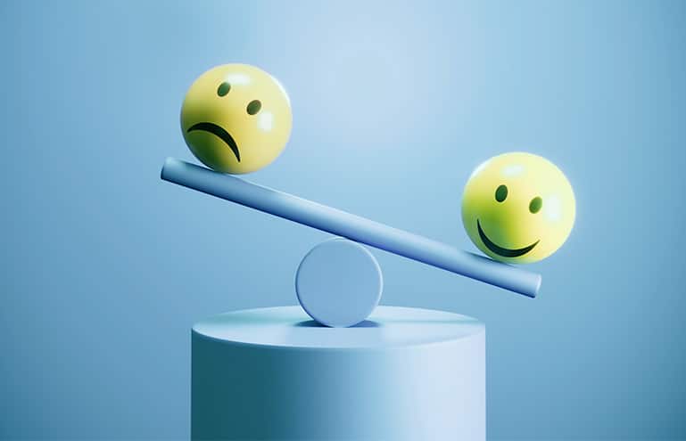 sad and happy faces balance concept for solo attorney well-being report featured image
