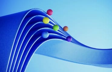 Abstract representation of Lawyer Collective Action: multicolored spheres (citizens) resting on or moving along the edges of a layered blue ribbon