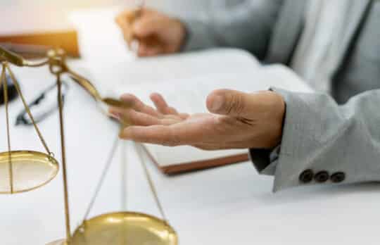 Lawyer preparing a deposition outline.