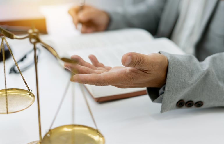 Lawyer preparing a deposition outline.