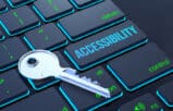 Computer keyboard with Accessibility key and physical key for law firm website accessibility