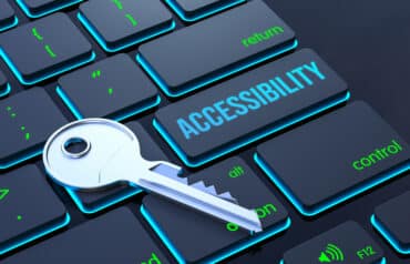 Computer keyboard with Accessibility key and physical key for law firm website accessibility