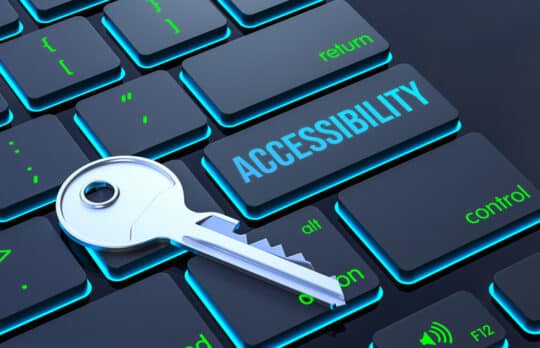 Computer keyboard with Accessibility key and physical key for law firm website accessibility