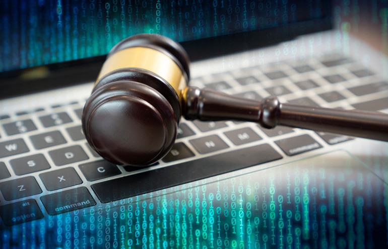 Legal Technology: Gavel on computer keyboard