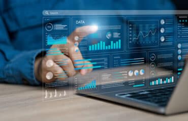 Legal professional analyzing an interactive visual report using Microsoft Copilot for law firm dashboards.