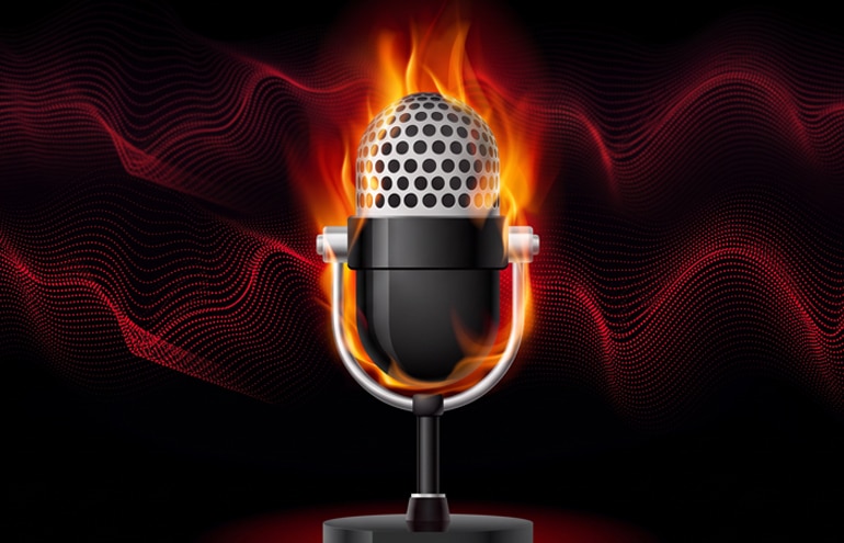 A glowing microphone surrounded by flames, illustrating the hot topic of legal ethics and podcasting.