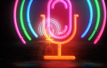 A stylized neon graphic of a microphone on a desk, representing a high-quality professional legal podcast production.