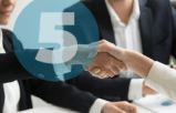 lawyers shaking hands referring cases and shaking hands